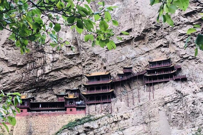 Beijing to Datong See YunGang Cave, Hanging Temple (Bullet Train) - Hanging Temple at Xuankong Si: wood, stone, and a cliffside design
