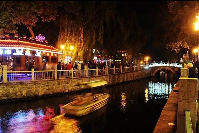 Private Night Tour: Discover Beijing in Bustling Lights - Hutong-era structure passes: Bell and Drum Towers and the old-city framing
